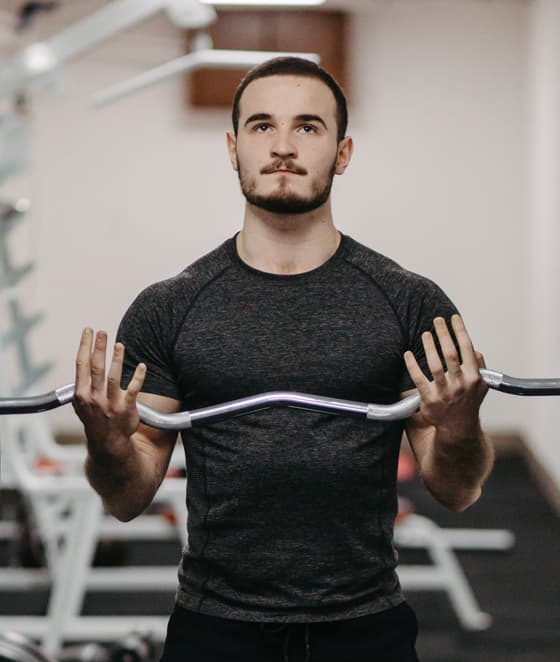 Personal trainer demonstrating strength training
